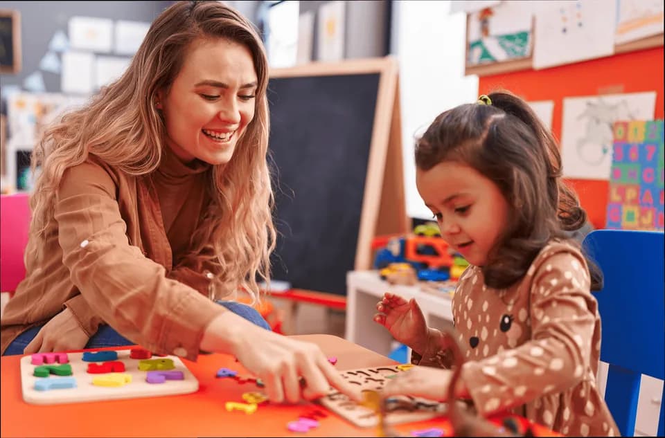 A teacher reading with a small group of children