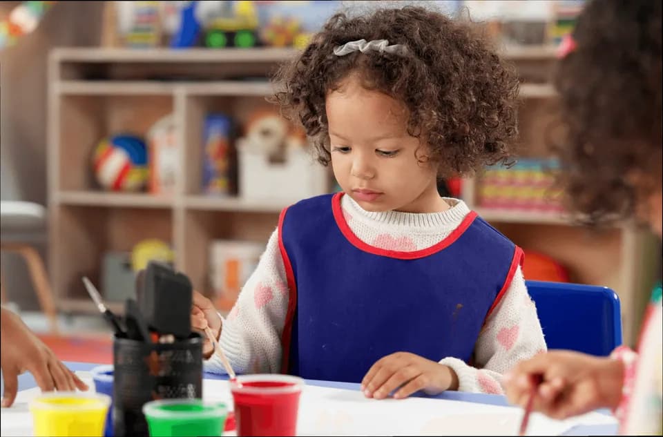 Children working together at a craft table
